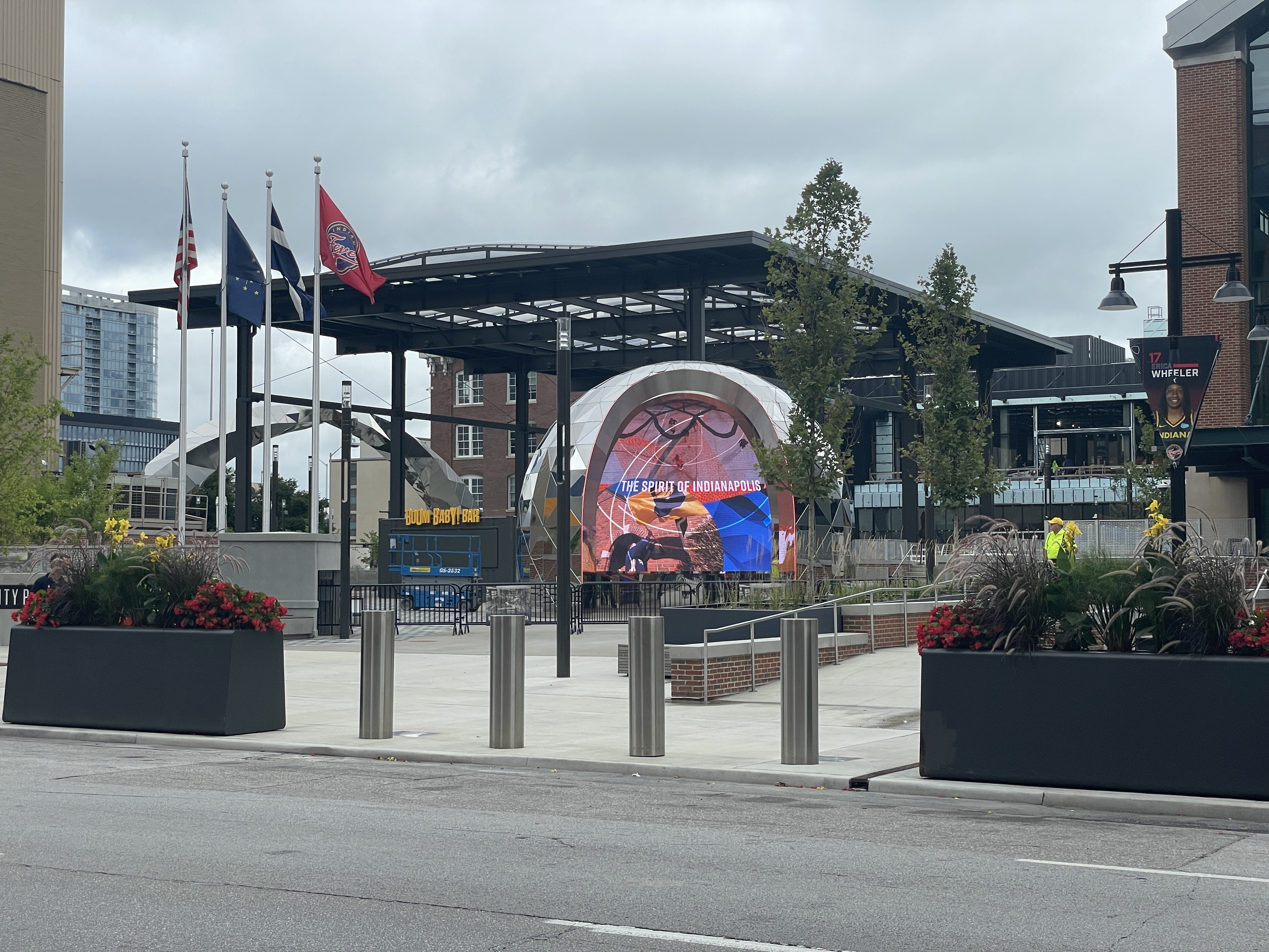 Daytime view of Bicentennial Unity Plaza showing the full mirrored sculpture and surrounding plaza